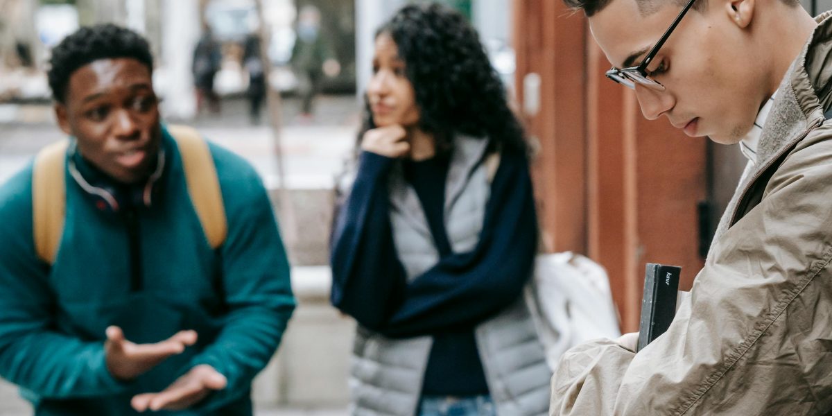 Young people engaging in a lively discussion or debate, symbolizing the activism on college campuses.